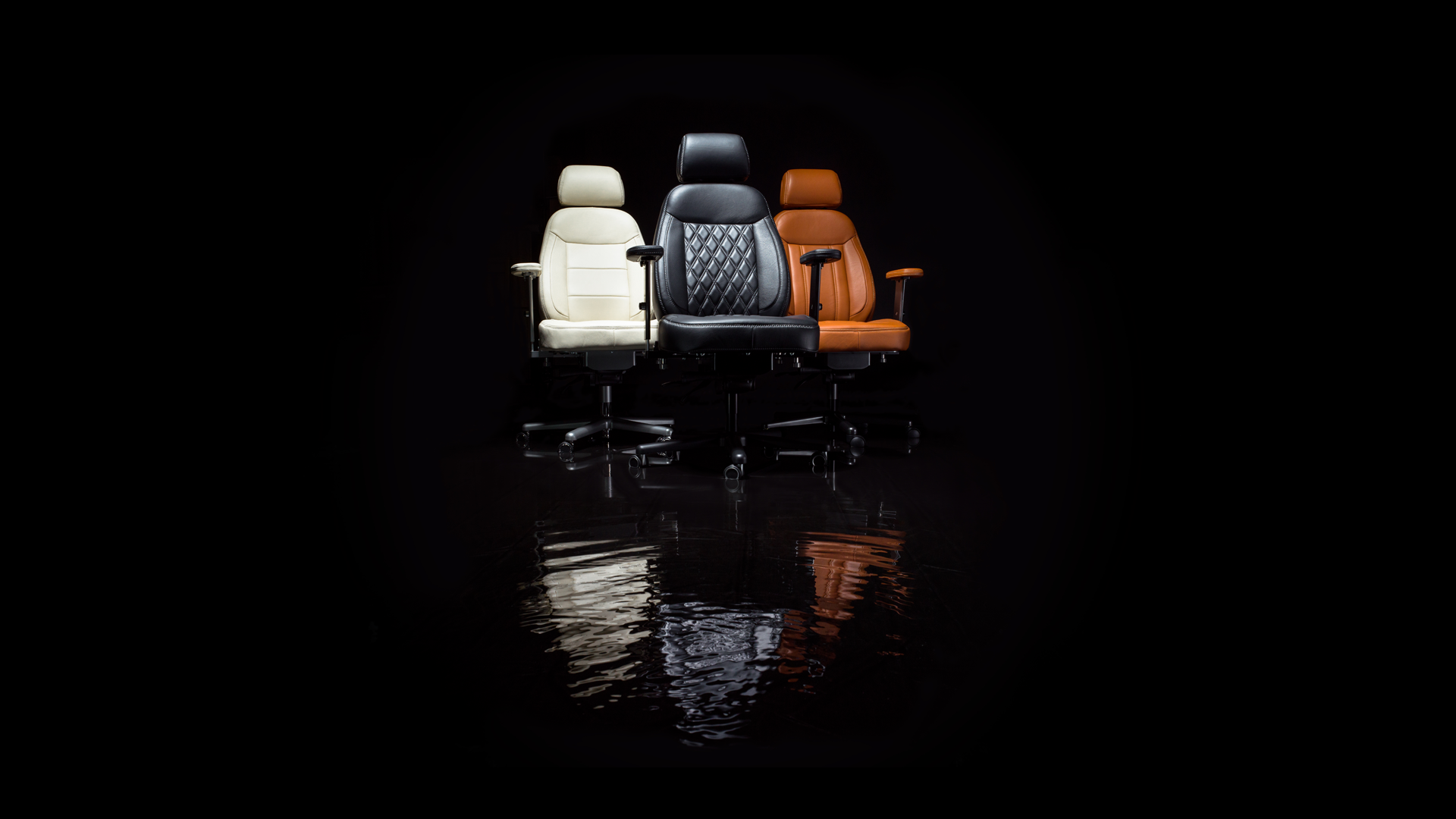 three DLX chairs in different colors